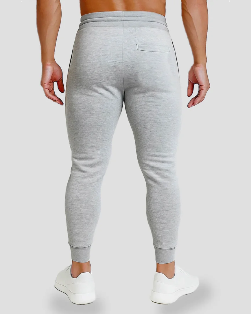 Pánske sivé slim tepláky s vreckami na zips, pohodlné fitness nohavice na cvičenie a voľný čas
