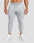 Pánske sivé slim tepláky s vreckami na zips, pohodlné fitness nohavice na cvičenie a voľný čas